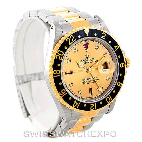 The image shows a three-quarter angled view of a Rolex GMT-Master 16713 Men's Stainless Steel Champagne Dial 16713 Men's Stainless Steel Champagne Dial watch, highlighting the face, bezel, and part of the bracelet.