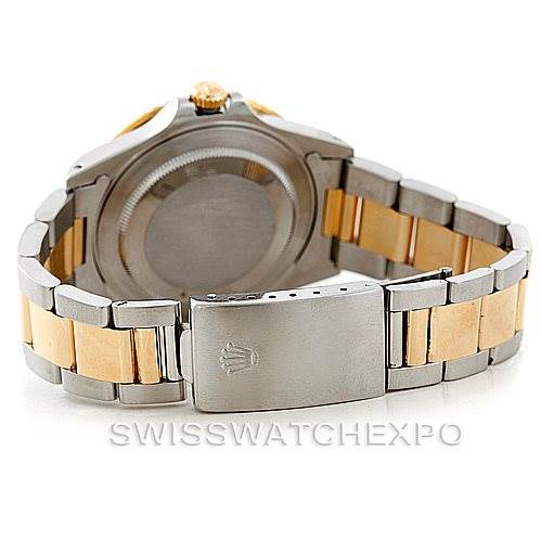 This image shows the back and bracelet of a Rolex GMT-Master 16713 Men's Stainless Steel Champagne Dial 16713 Men's Stainless Steel Champagne Dial, highlighting the clasp and two-tone metal design.