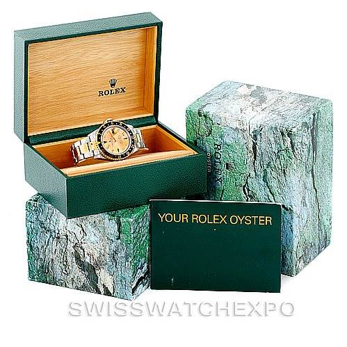 The image shows a Rolex GMT-Master 16713 Men's Stainless Steel Champagne Dial 16713 Men's Stainless Steel Champagne Dial watch in its box, with additional packaging and a "Your Rolex Oyster" booklet.