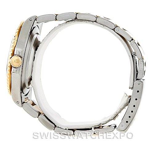 The image shows a side profile of a Rolex GMT-Master 16713 Men's Stainless Steel Champagne Dial 16713 Men's Stainless Steel Champagne Dial watch, highlighting its case, bezel, and bracelet.