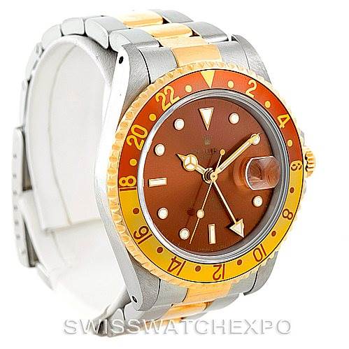 This image shows a front angle of a Rolex GMT-Master 16713 Men
s Stainless Steel Brown Dial 16713 Men
s Stainless Steel Brown Dial model watch, highlighting its bezel, dial, and bracelet.