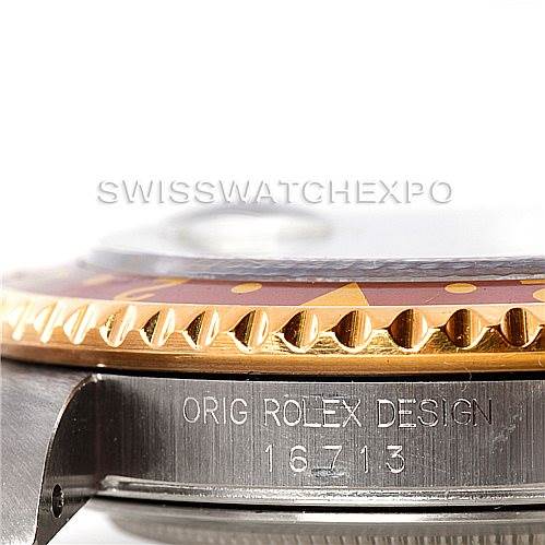 This image shows a close-up of the bezel and case side of the Rolex GMT-Master 16713 Men
s Stainless Steel Brown Dial 16713 Men
s Stainless Steel Brown Dial model, displaying the design number "16713".