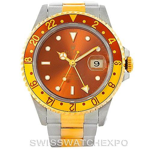 This is a front view of the Rolex GMT-Master 16713 Men
s Stainless Steel Brown Dial 16713 Men
s Stainless Steel Brown Dial watch, showing the bezel, dial, hands, and part of the bracelet.