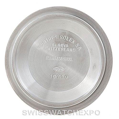 The image shows the case back of a Rolex GMT-Master 16713 Men
s Stainless Steel Brown Dial 16713 Men
s Stainless Steel Brown Dial watch, displaying engravings and model number 16710.