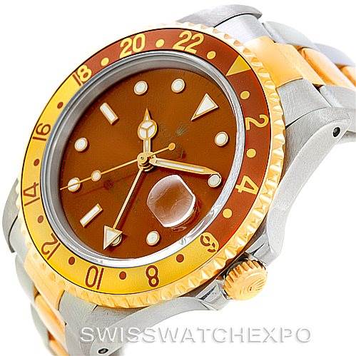 This image shows a side and partial front view of the Rolex GMT-Master 16713 Men
s Stainless Steel Brown Dial 16713 Men
s Stainless Steel Brown Dial watch, highlighting the bezel, crown, and bracelet.
