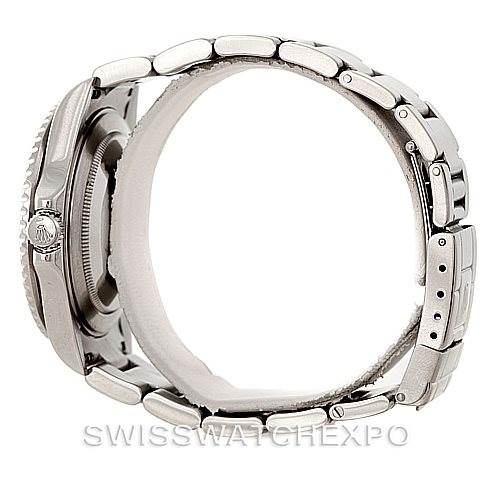 This image shows a Rolex GMT-Master 16710 Men's Stainless Steel Black Dial 16710 Men's Stainless Steel Black Dial watch from the side, highlighting the stainless steel bracelet and the crown on the left.