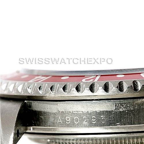 This image shows a close-up side view of the bezel and serial number on a Rolex GMT-Master 16710 Men's Stainless Steel Black Dial 16710 Men's Stainless Steel Black Dial watch.