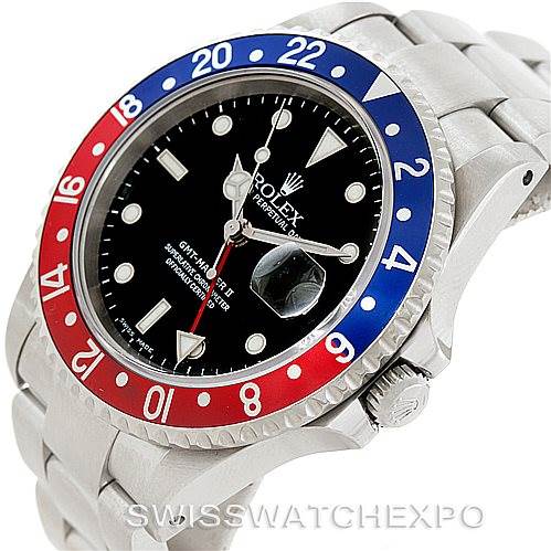 This image shows a Rolex GMT-Master 16710 Men's Stainless Steel Black Dial 16710 Men's Stainless Steel Black Dial watch angled to display its red and blue bezel, black dial, crown, and Oyster bracelet.