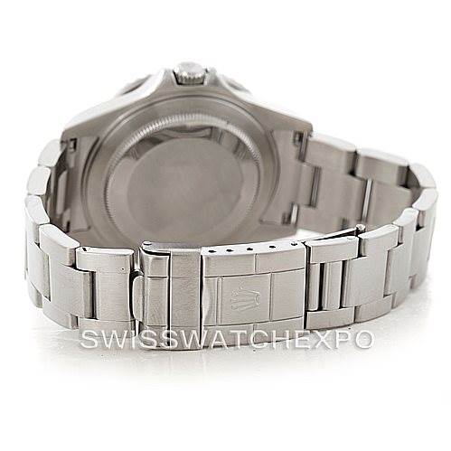 The image shows the back case and clasp of a Rolex GMT-Master 16710 Men's Stainless Steel Black Dial 16710 Men's Stainless Steel Black Dial watch from an angle with the bracelet partially open.