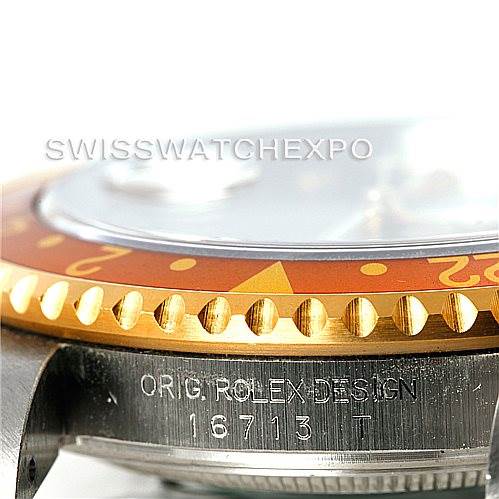 This image shows a close-up of the side view of a Rolex GMT-Master 16713 Men's Stainless Steel Grey Dial 16713 Men's Stainless Steel Grey Dial watch, focusing on the bezel, case, and engraved serial number "16713".