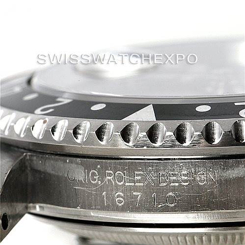 The image shows a close-up of the bezel, dial edge, and case side of a Rolex GMT-Master 16710 Men
s Stainless Steel Black Dial 16710 Men
s Stainless Steel Black Dial model.