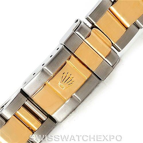 This image shows a close-up of the two-tone bracelet and clasp, featuring the Rolex crown logo, of a Rolex GMT-Master 16713 Men's Stainless Steel Black Dial 16713 Men's Stainless Steel Black Dial watch.