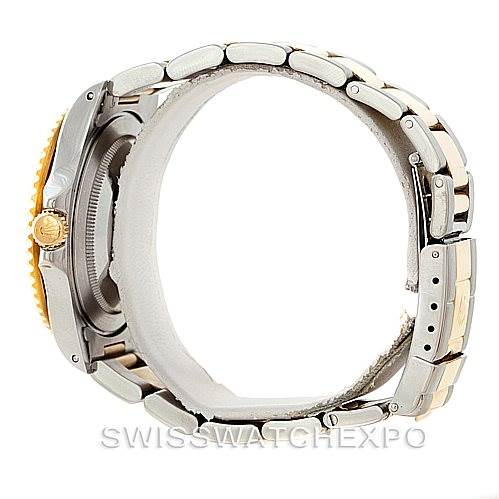 Side view of a Rolex GMT-Master 16713 Men's Stainless Steel Black Dial 16713 Men's Stainless Steel Black Dial watch showing the bracelet, side case, and crown.