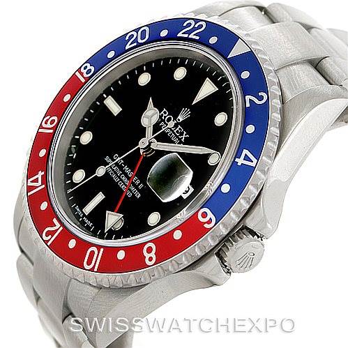 The image shows a close-up angle of the dial, bezel, case, crown, and part of the bracelet of a Rolex GMT-Master 16710 Men's Stainless Steel Black Dial 16710 Men's Stainless Steel Black Dial watch.