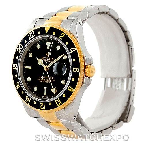 This image shows a Rolex GMT-Master 16713 Men
s Stainless Steel Black Dial 16713 Men
s Stainless Steel Black Dial watch at a three-quarter angle, highlighting the dial, bezel, bracelet, and crown.