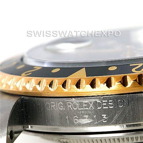 This close-up image captures the side view of a Rolex GMT-Master 16713 Men
s Stainless Steel Black Dial 16713 Men
s Stainless Steel Black Dial bezel, indicating the model number 16713.