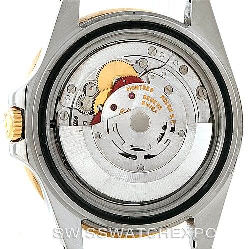 This image shows the back view of a Rolex GMT-Master 16713 Men's Stainless Steel Black Dial 16713 Men's Stainless Steel Black Dial watch, exposing its inner mechanical movement and components.