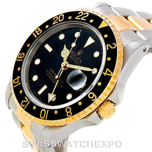 This image shows a Rolex GMT-Master 16713 Men's Stainless Steel Black Dial 16713 Men's Stainless Steel Black Dial watch, angled to display its face, bezel, crown, and part of the bracelet.
