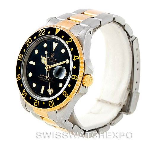 The image shows the Rolex GMT-Master 16713 Men's Stainless Steel Black Dial 16713 Men's Stainless Steel Black Dial watch at an angle displaying the face, bezel, crown, and part of the bracelet.