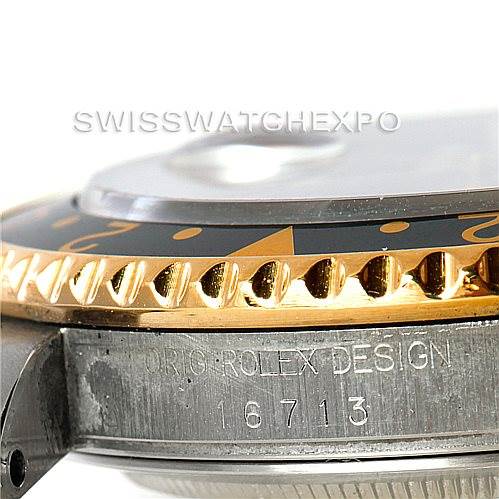 This image shows a close-up side view of a Rolex GMT-Master 16713 Men's Stainless Steel Black Dial 16713 Men's Stainless Steel Black Dial, focusing on the bezel, edge of the case, and model number engraving (16713).