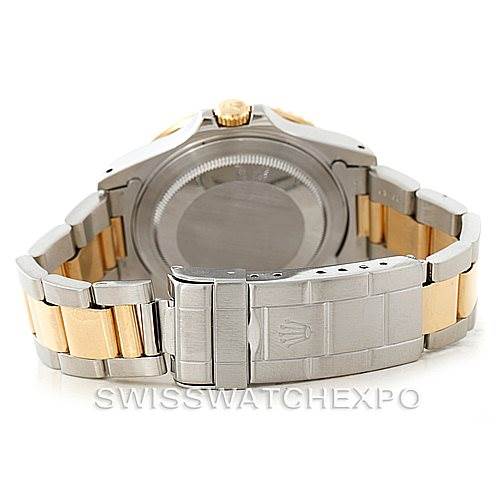 The image shows the back and clasp of the Rolex GMT-Master 16713 Men's Stainless Steel Black Dial 16713 Men's Stainless Steel Black Dial watch, emphasizing its two-tone bracelet and engraved clasp.