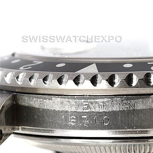 This close-up image of the Rolex GMT-Master 16710 Men's Stainless Steel Black Dial 16710 Men's Stainless Steel Black Dial shows the bezel and part of the case, including the model number 16710.