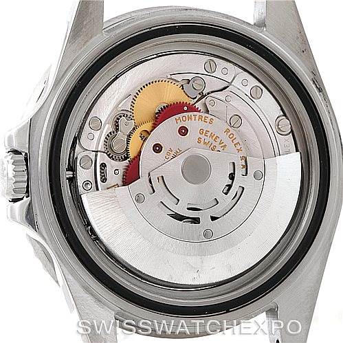 The image shows a close-up of the movement of a Rolex GMT-Master 16710 Men's Stainless Steel Black Dial 16710 Men's Stainless Steel Black Dial watch with the back case removed.