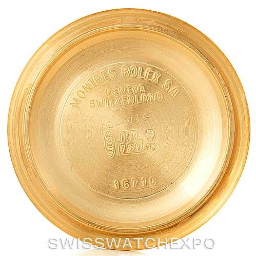 This image shows the inside case back of a Rolex GMT-Master 16718 Men's Yellow Gold Black Dial 16718 Men's Yellow Gold Black Dial watch, highlighting brand engravings and hallmarks.