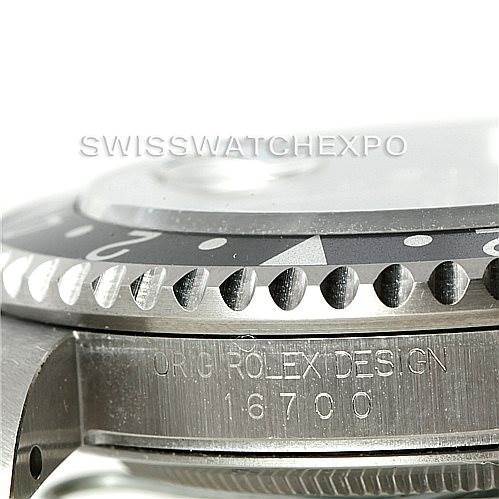The image shows a close-up of the bezel and side case, including the model engraving "16700" of a Rolex GMT-Master 16700 Men's Stainless Steel Black Dial 16700 Men's Stainless Steel Black Dial watch.