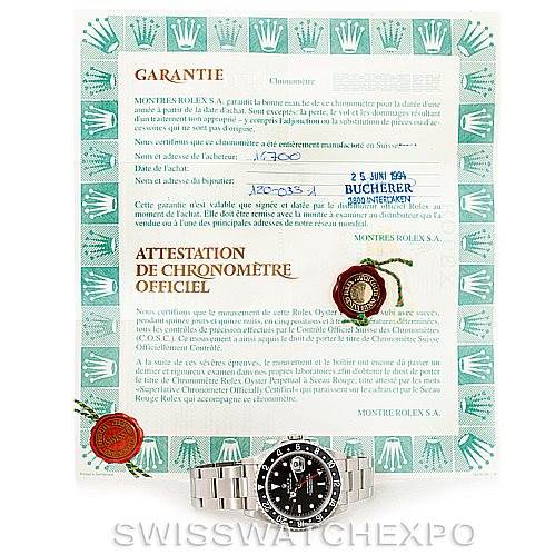 The image shows a Rolex GMT-Master 16700 Men's Stainless Steel Black Dial 16700 Men's Stainless Steel Black Dial watch placed at the bottom of a warranty certificate.