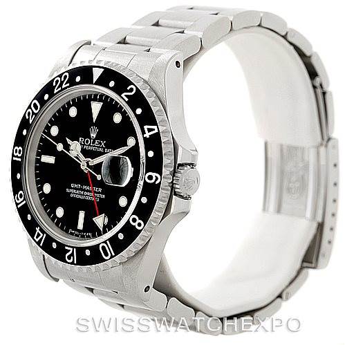 The image shows a Rolex GMT-Master 16700 Men's Stainless Steel Black Dial 16700 Men's Stainless Steel Black Dial watch at an angled side view, highlighting the bezel, crown, and bracelet.