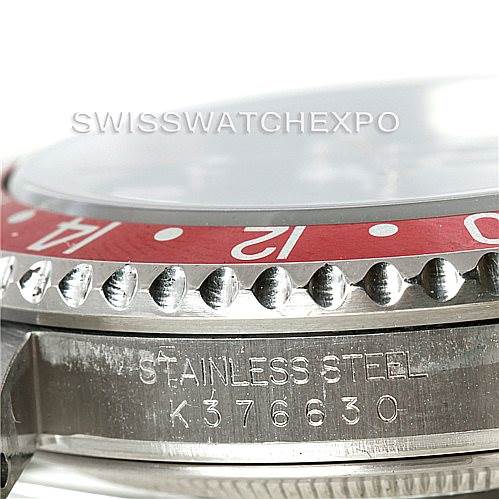 The image shows a close-up side view of the bezel, crystal, and engraved case of a Rolex GMT-Master 16710 Men's Stainless Steel Black Dial 16710 Men's Stainless Steel Black Dial watch.