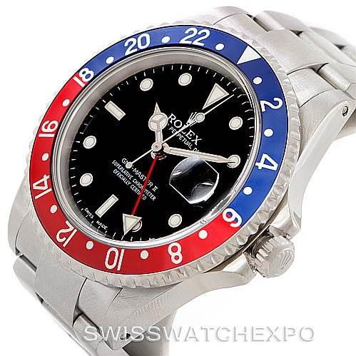 This is a Rolex GMT-Master 16710 Men's Stainless Steel Black Dial 16710 Men's Stainless Steel Black Dial watch shown at an angle displaying its bezel, crown, dial, and part of the bracelet.