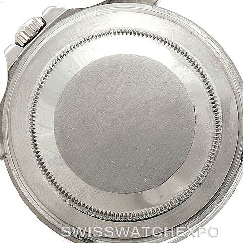 The image shows the case back of a Rolex GMT-Master 16710 Men's Stainless Steel Black Dial 16710 Men's Stainless Steel Black Dial watch, displaying its screw-down mechanism and crown.