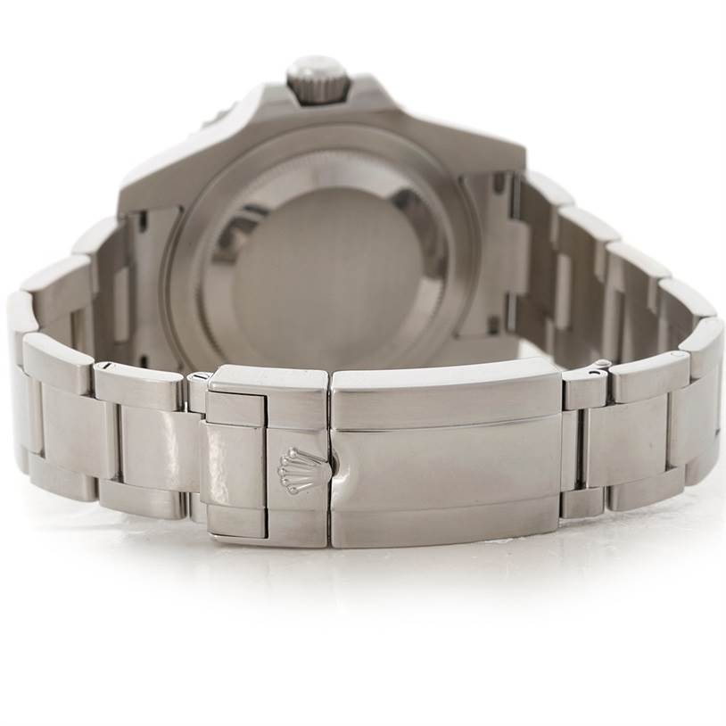 The image shows the back of a Rolex GMT-Master 116710 Men
s Stainless Steel Black Dial 116710 Men
s Stainless Steel Black Dial watch with a view of its clasp and bracelet.