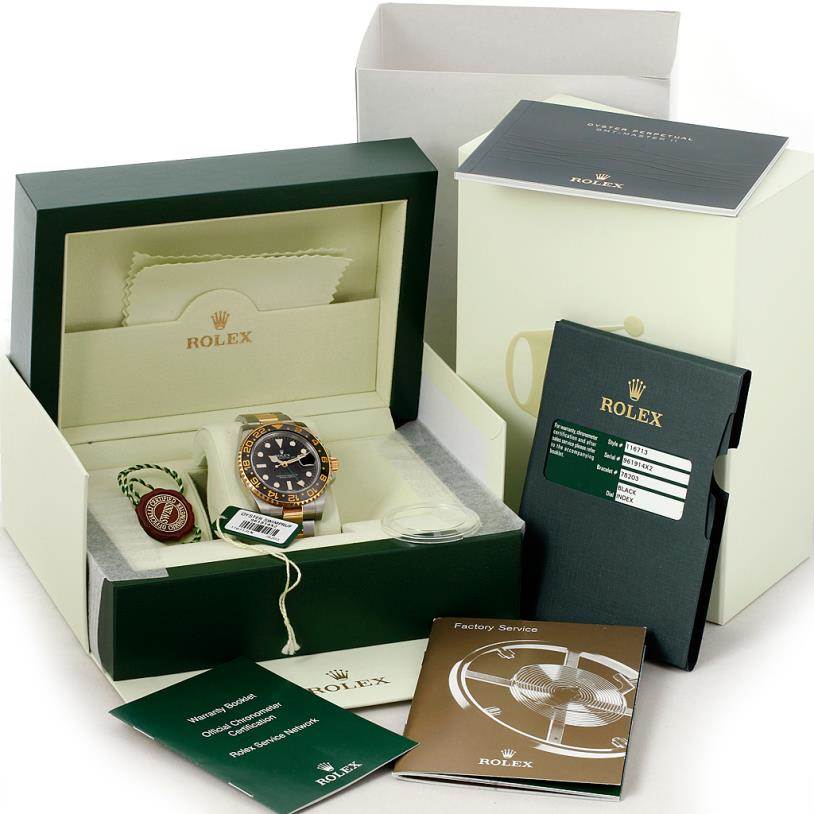The image shows a Rolex GMT-Master 116713 Men's Stainless Steel Black Dial 116713 Men's Stainless Steel Black Dial watch in its box, with various accessories and documentation laid out.