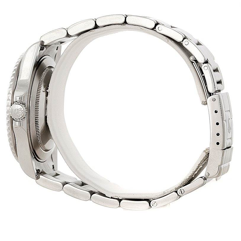 The image shows a Rolex GMT-Master 16710 Men
s Stainless Steel Black Dial 16710 Men
s Stainless Steel Black Dial watch from a side angle, highlighting the bracelet, clasp, and part of the case.