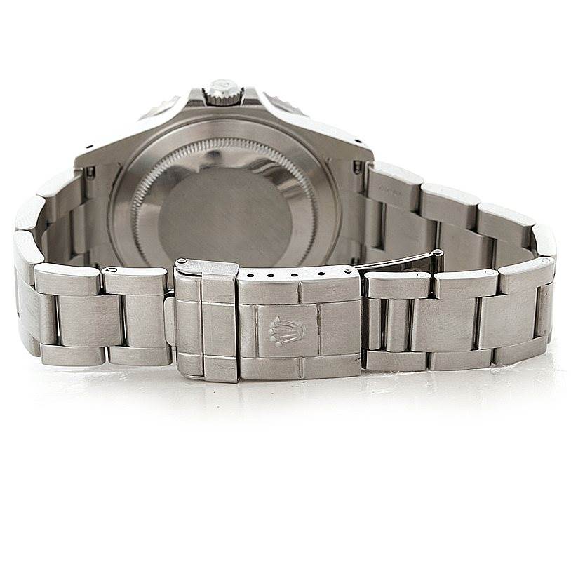 The image shows the back view of a Rolex GMT-Master 16710 Men
s Stainless Steel Black Dial 16710 Men
s Stainless Steel Black Dial watch, highlighting the bracelet and clasp.