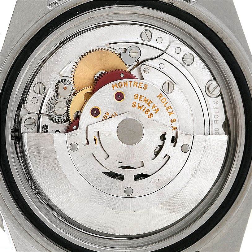 This image shows the internal mechanism and parts of a Rolex GMT-Master 16710 Men
s Stainless Steel Black Dial 16710 Men
s Stainless Steel Black Dial watch, with a focus on the movement components.