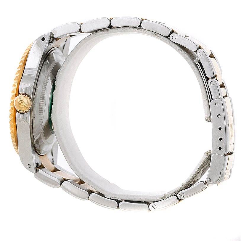 The image shows a side profile of the Rolex GMT-Master 16713 Men's Stainless Steel Black Dial 16713 Men's Stainless Steel Black Dial watch, highlighting the crown, part of the bezel, and the bracelet.