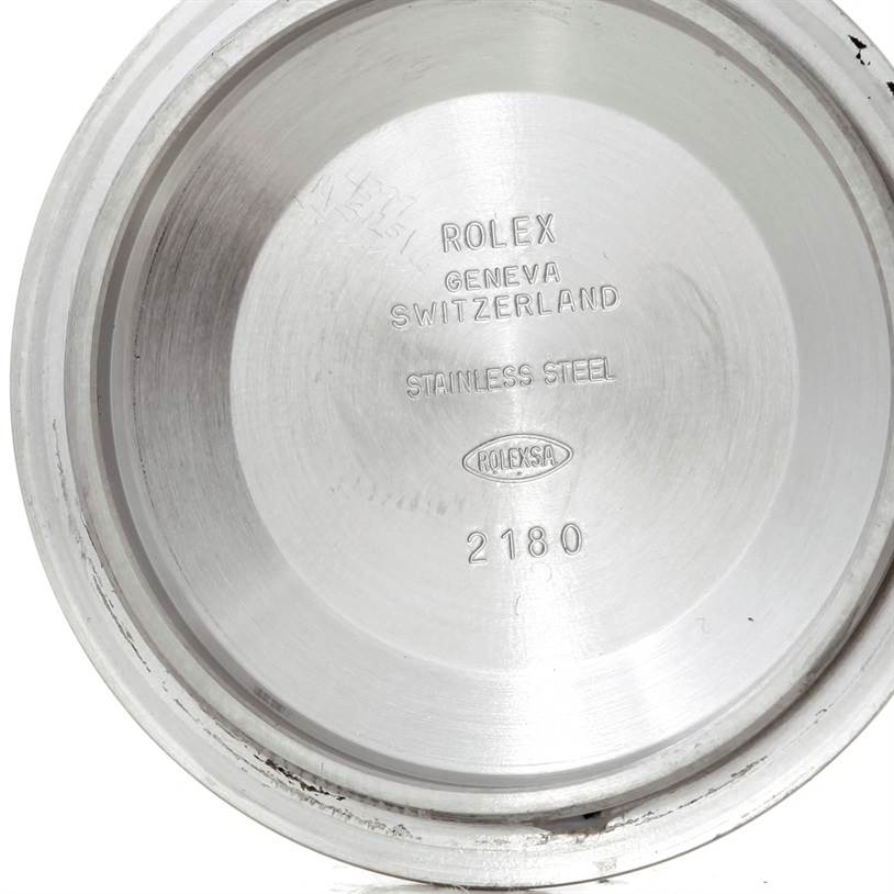 The image shows the inside of the case back of a Rolex GMT-Master 16710 Men's Stainless Steel Black Dial 16710 Men's Stainless Steel Black Dial, highlighting the brand's engravings.