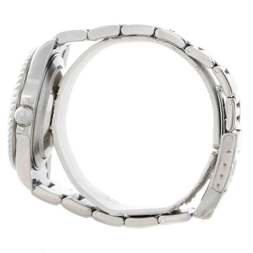 Side view showcasing the case, crown, bezel, and part of the bracelet of the Rolex GMT-Master 16710 Men's Stainless Steel Black Dial 16710 Men's Stainless Steel Black Dial watch.