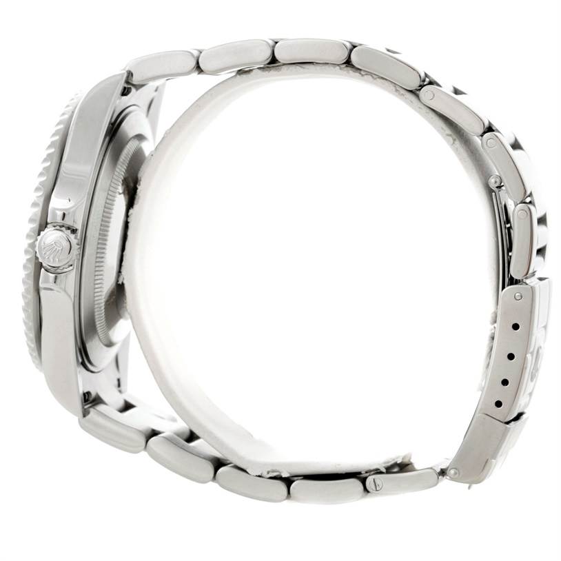 The image shows a side profile of the Rolex GMT-Master 16710 Men's Stainless Steel Black Dial 16710 Men's Stainless Steel Black Dial watch, highlighting the case, crown, and metal bracelet.