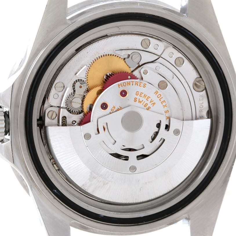 The image shows the intricate internal mechanism of a Rolex GMT-Master 16710 Men's Stainless Steel Black Dial 16710 Men's Stainless Steel Black Dial watch from a rear angle with the case back removed.