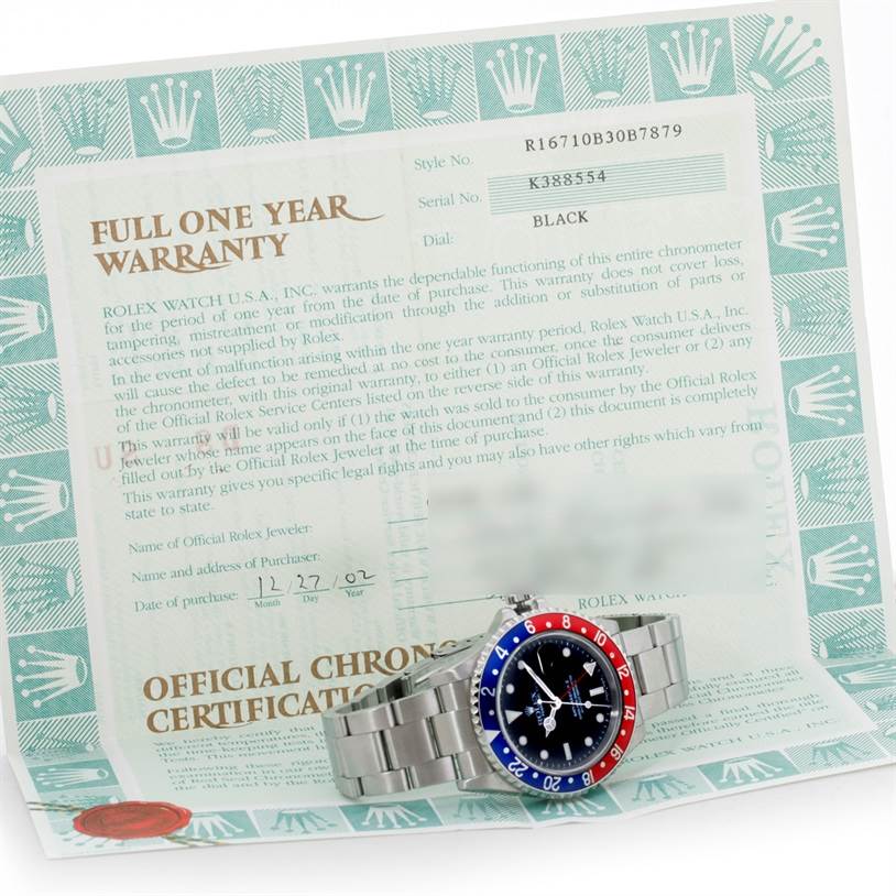 The image shows a Rolex GMT-Master 16710 Men's Stainless Steel Black Dial 16710 Men's Stainless Steel Black Dial watch displaying the front dial and bracelet, with its warranty card in the background.