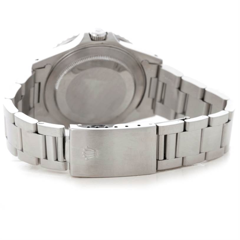 The image shows the back view of a Rolex GMT-Master 16710 Men's Stainless Steel Black Dial 16710 Men's Stainless Steel Black Dial watch, highlighting its stainless steel case back and bracelet clasp.