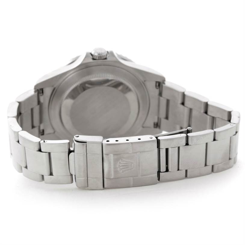 The Rolex GMT-Master 16710 Men's Stainless Steel Black Dial 16710 Men's Stainless Steel Black Dial watch is shown from the back, highlighting its clasp, case back, and part of the bracelet.