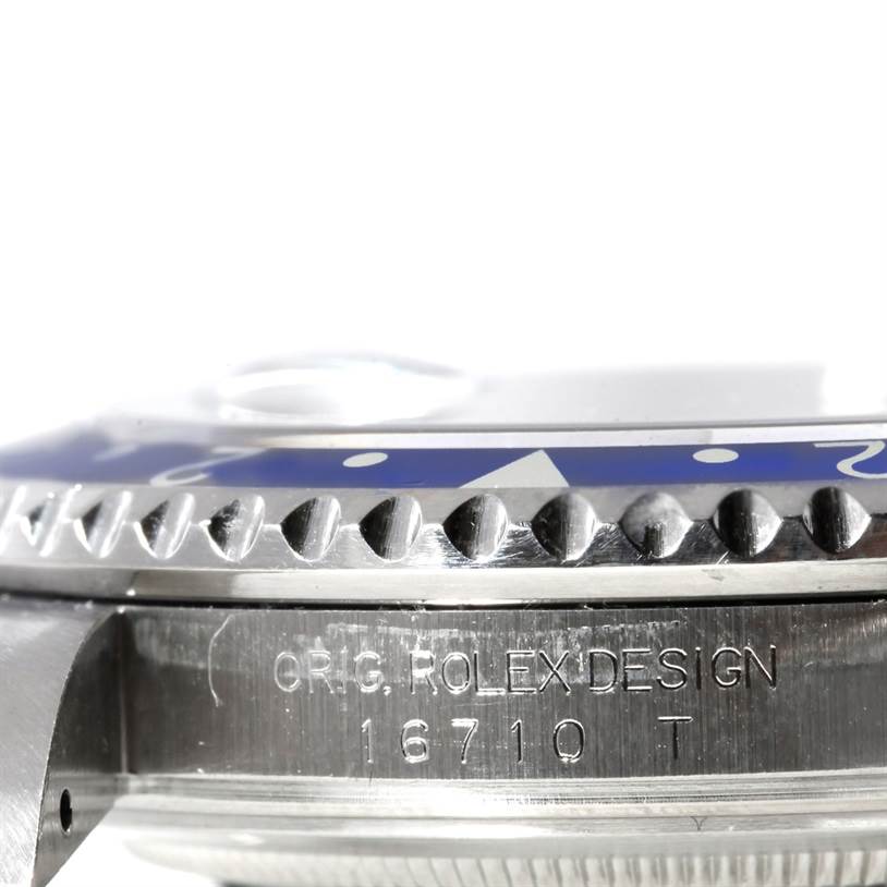 This image shows a close-up of the side and bezel of a Rolex GMT-Master 16710 Men's Stainless Steel Black Dial 16710 Men's Stainless Steel Black Dial watch, model number 16710.