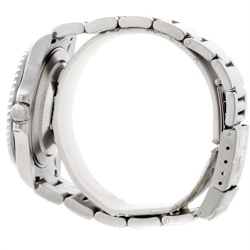 The image shows a side view of the Rolex GMT-Master 16710 Men's Stainless Steel Black Dial 16710 Men's Stainless Steel Black Dial watch, highlighting the bracelet and crown.