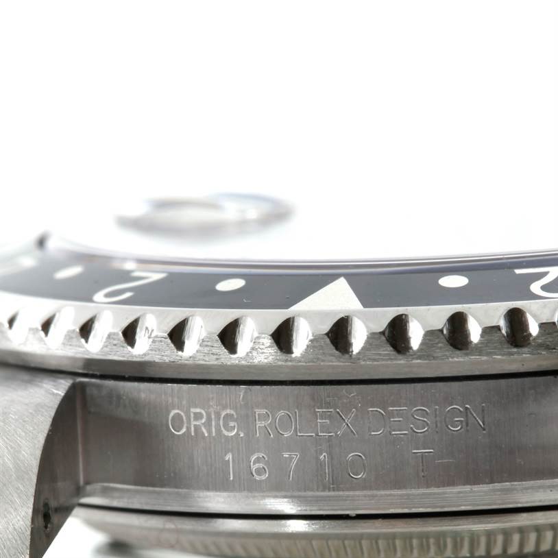 The image shows a close-up side view of a Rolex GMT-Master 16710 Men's Stainless Steel Black Dial 16710 Men's Stainless Steel Black Dial model watch, focusing on the bezel and case with the model number 16710.